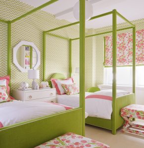 Lime & white Quadrille wallpaper in bedroom accented with pink.