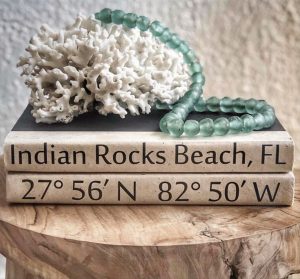 Personalized geo location on decorative book binding is a neat touch.