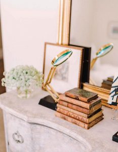 Old world style decorative books add a nice antique touch.