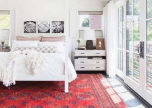 A red Oriental rug with other touches of red in accents can nicely "set" a room.