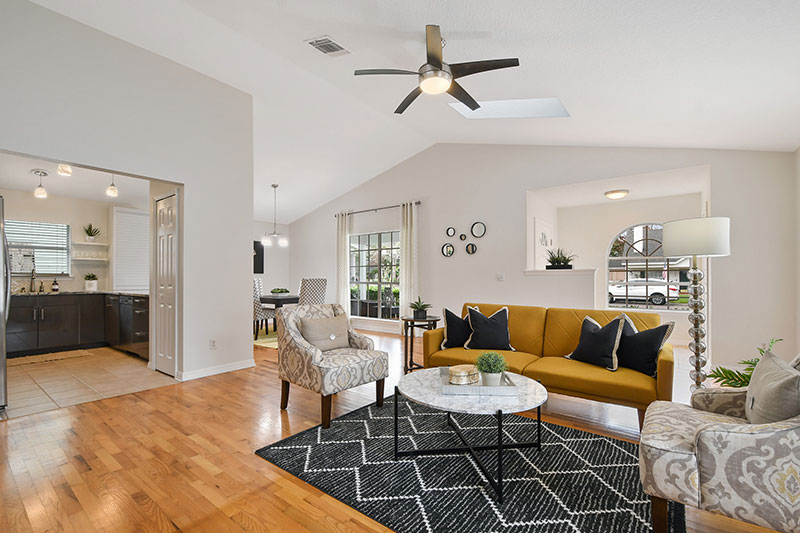 Bright, cheery living room area, inviting home!
