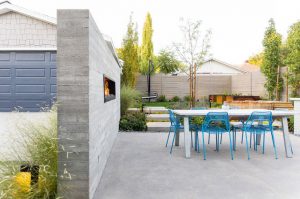 Concrete wall serves as landscaping screen