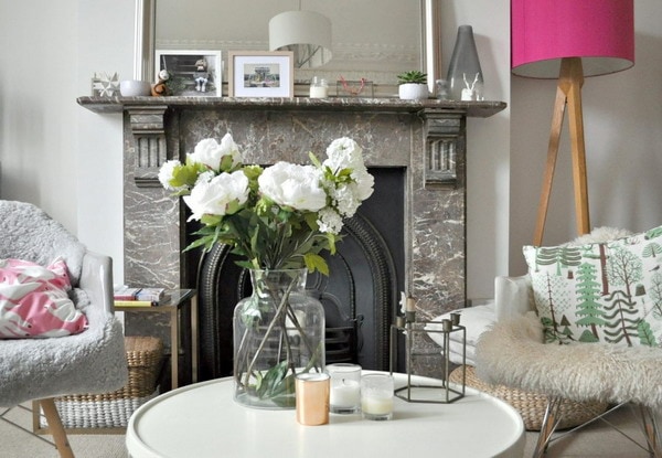 Modern technology makes artificial flowers indistinguishable from living arrangements.