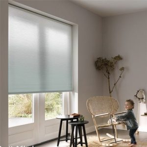 Cordless, motorized cellular honeycomb shades.