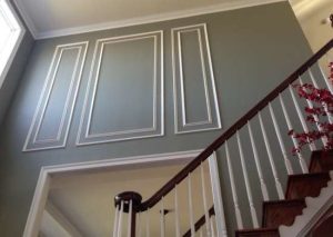 Not only does the trim used here frame the archways, it also creates sophisticated panels on the walls.
