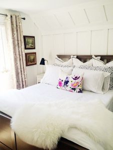 The choice to use molding to create panels from the floor to the ceiling took this standard accent wall and transformed it into a showstopper.