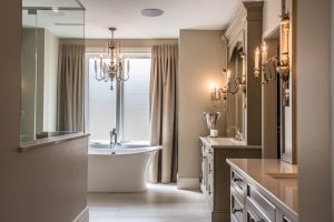 Crown molding in a lovely neutral bathroom setting