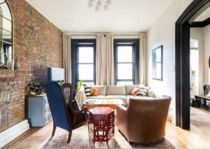 Let plain molding to quietly frame other parts of the room, like the arched doorway and windows, while letting its star feature shine.