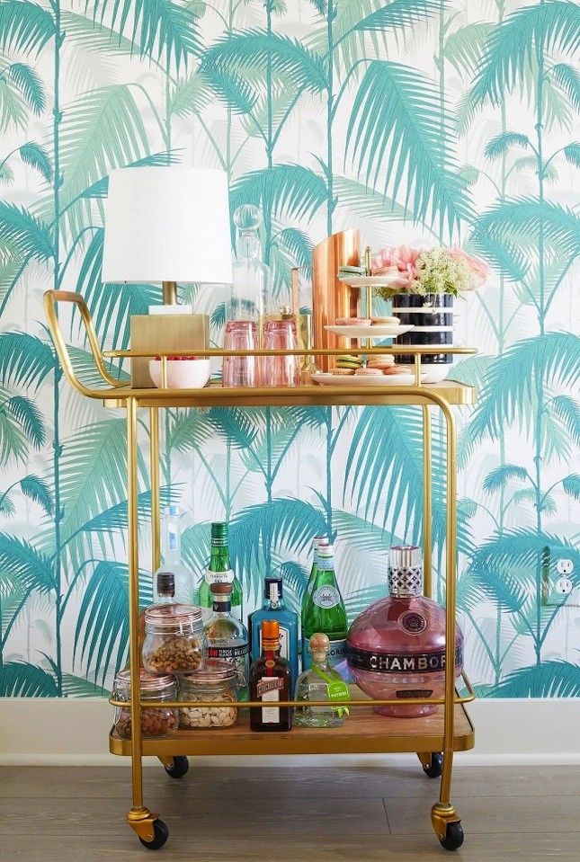 Tropical style wallpaper adds that island vibe.