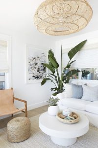 A neutral base lets you introduce tropical decor gently into your space.