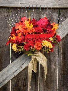 Autumn garden rake decoration for your door.