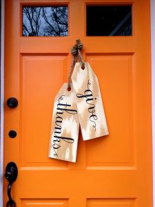 DIY hanging tags are a perfect alternative to a fall wreath for your door.