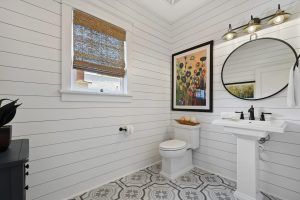 Woven Roman shades in the powder bath and throughout the house.