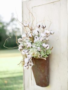 Hang a basket of dried florals instead of a wreath for fall.