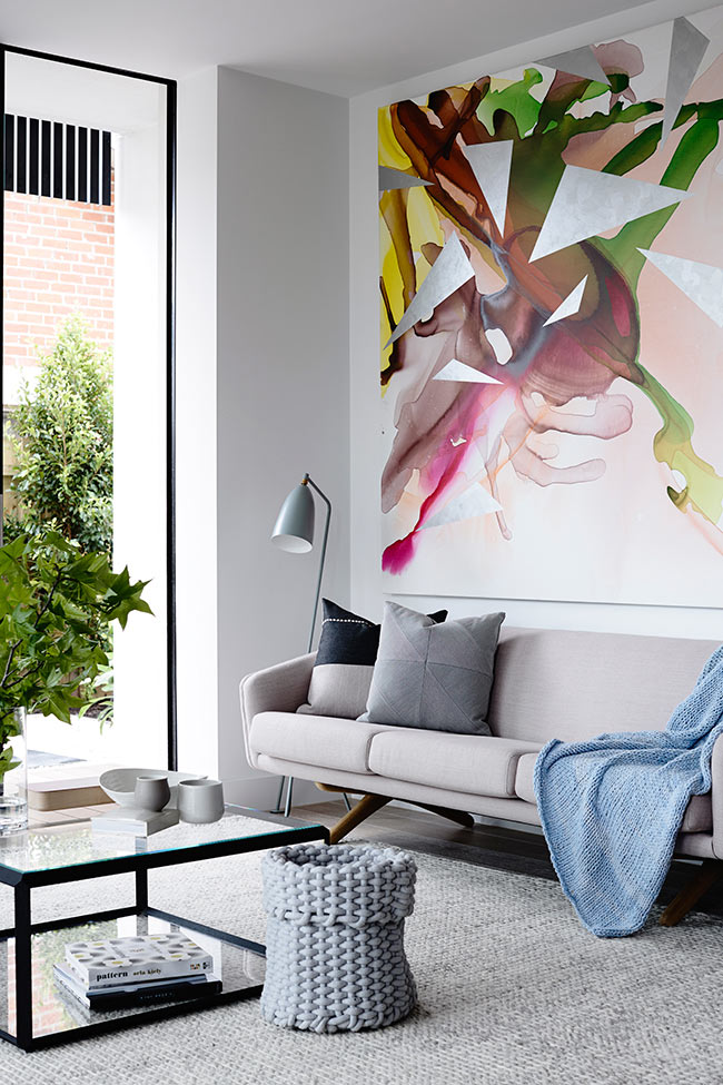 A large attractive painting can tie a room together beautifully.