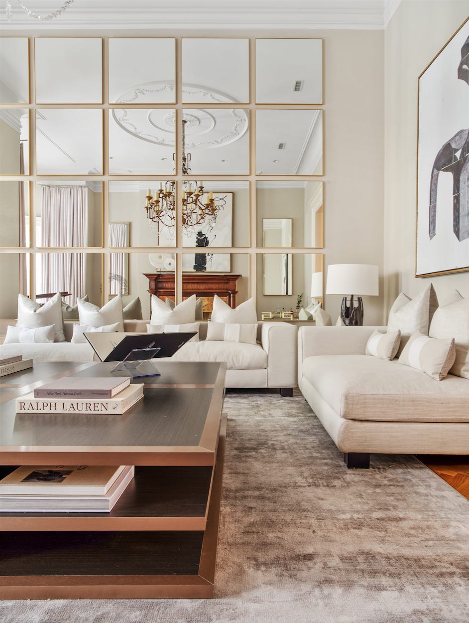 Open up a space by hanging multiple mirrors.