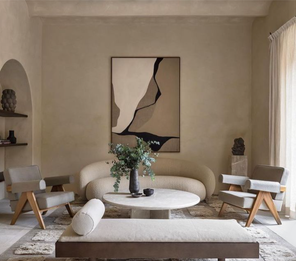 If you have tall ceilings in your living room, you should think about hanging a big wall decor piece.