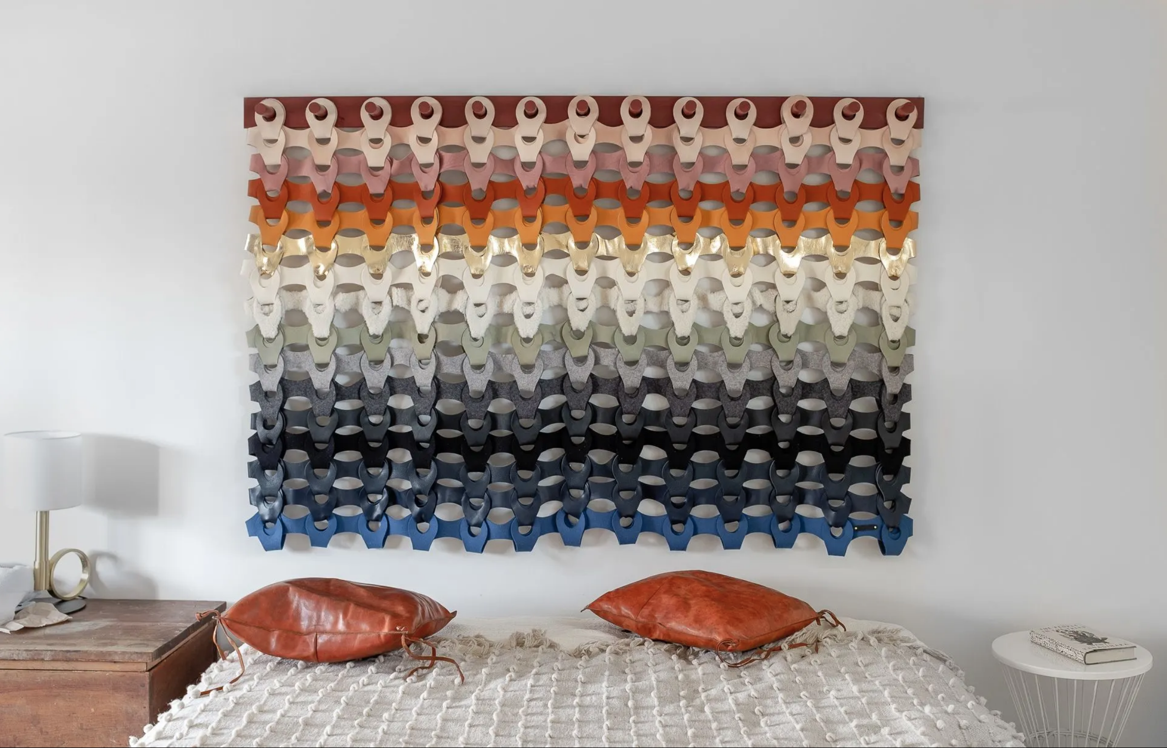 An easy way to cover a large amount of space is by choosing a colorful tapestry to hang above your furniture.