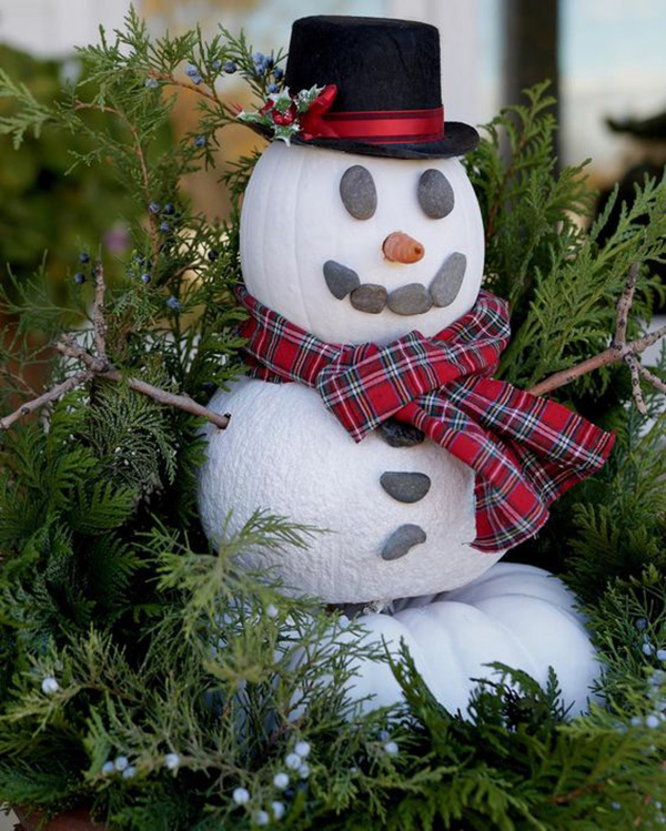 Paint fall pumpkins white and dress them up for seasonal decor lasting from fall through winter.