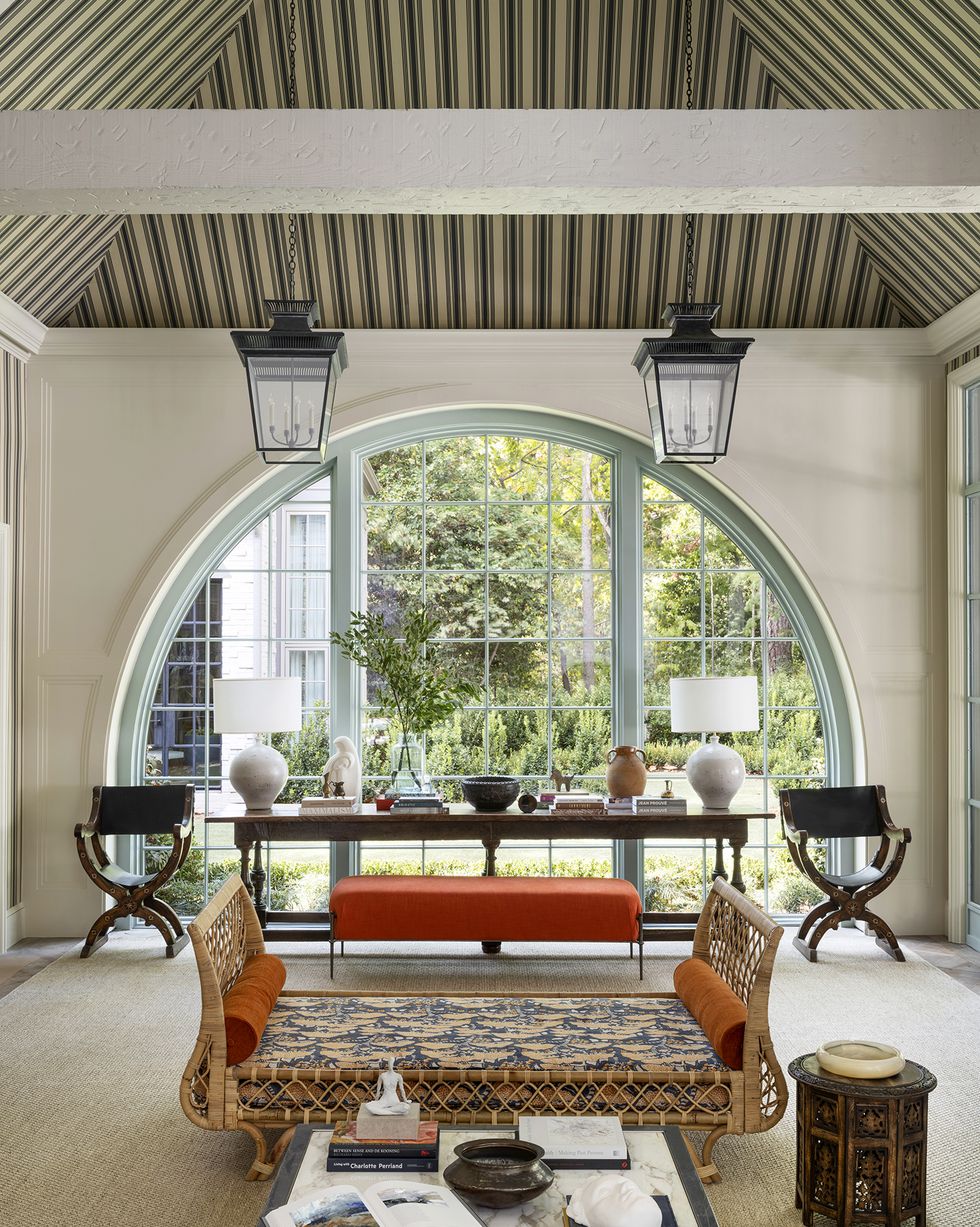 Daybeds are trending in 2023 living room decor.