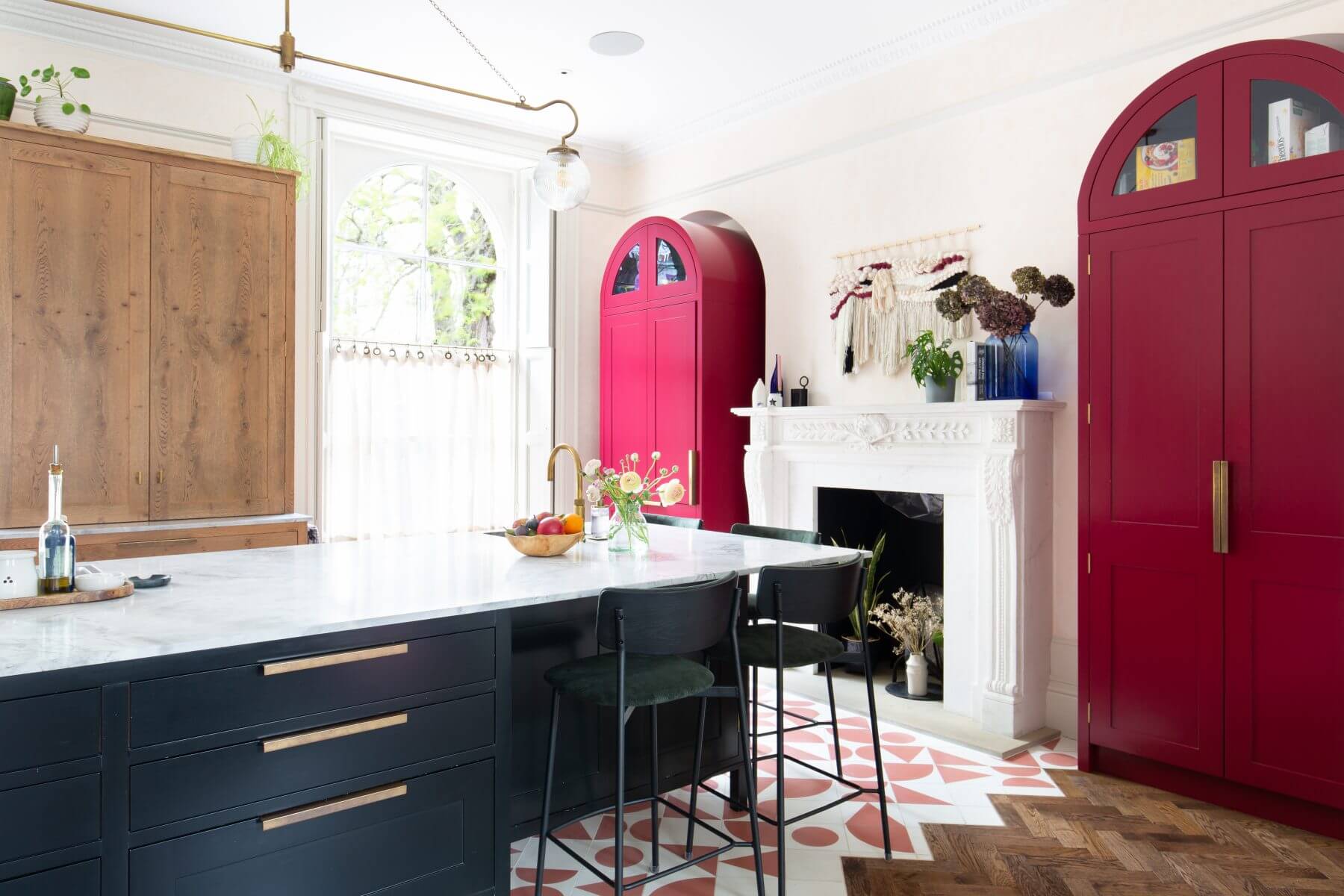 Viva Magenta built in kitchen area cabinets.