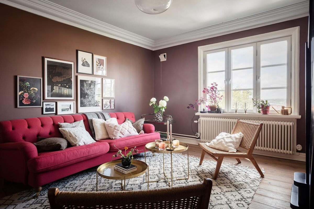 Earthy pink walls, Viva Magenta sofa.