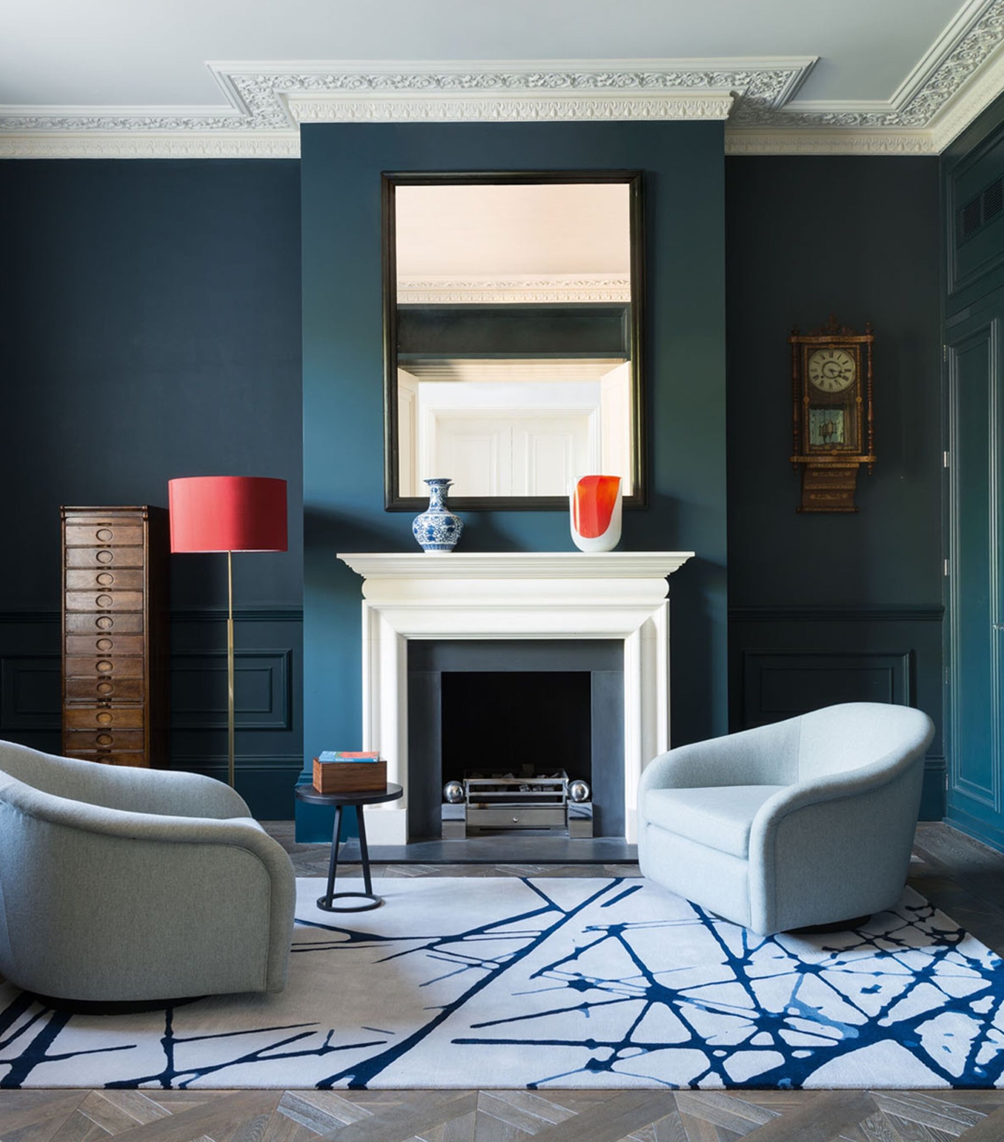 A boldly patterned rug can serve as the defining feature of a living area.