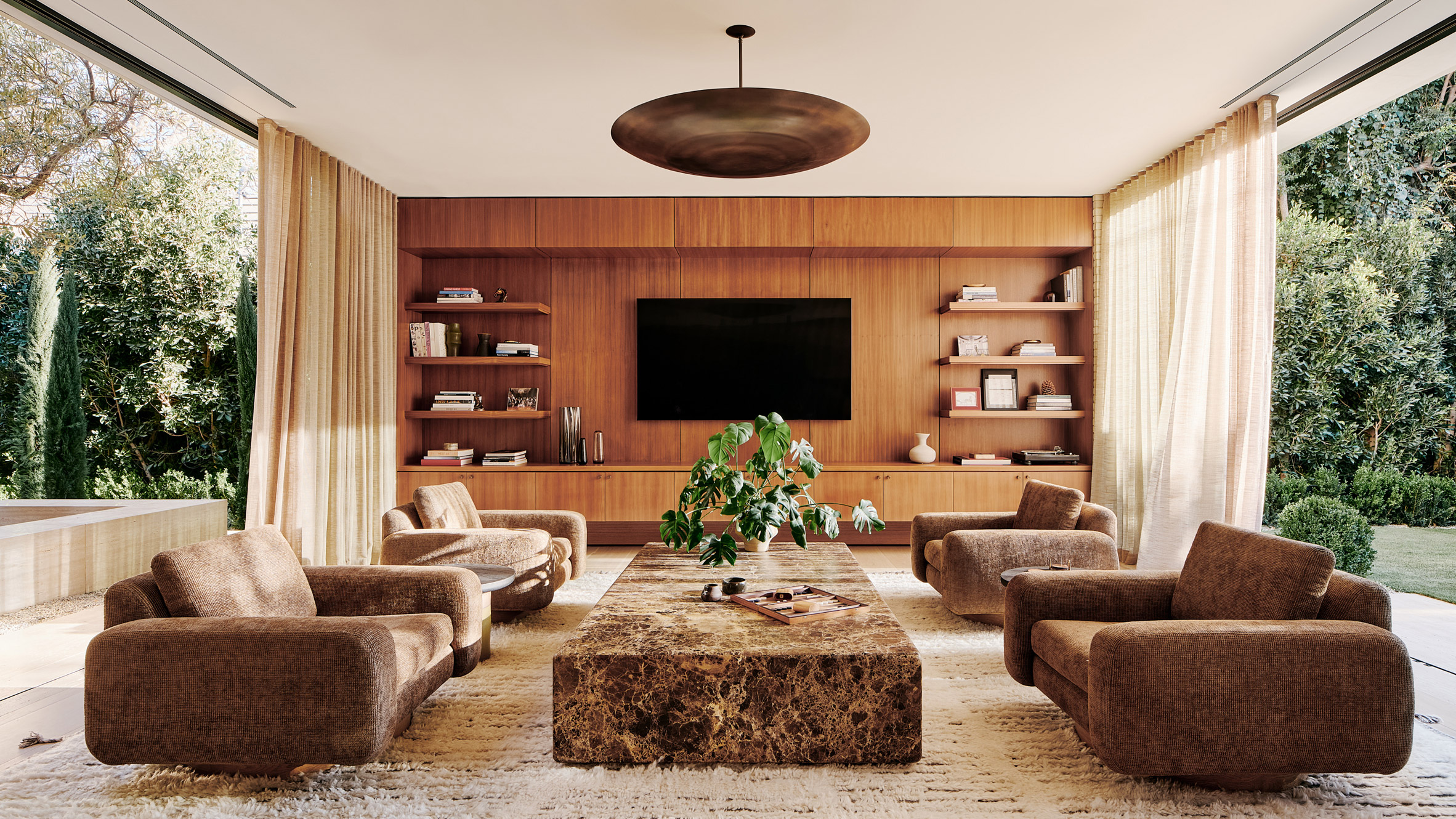 Warm neutrals, especially paired with even warmer woods, are emerging as a key 2023 paint trend.