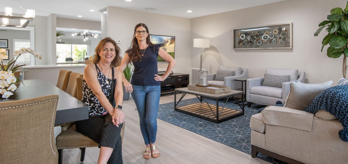 Carmen and her client in her newly-remodeled open-plan primary space.