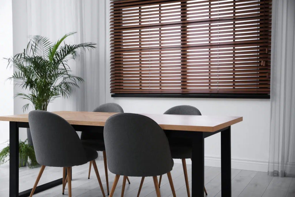 Try faux wood blinds in humid areas.