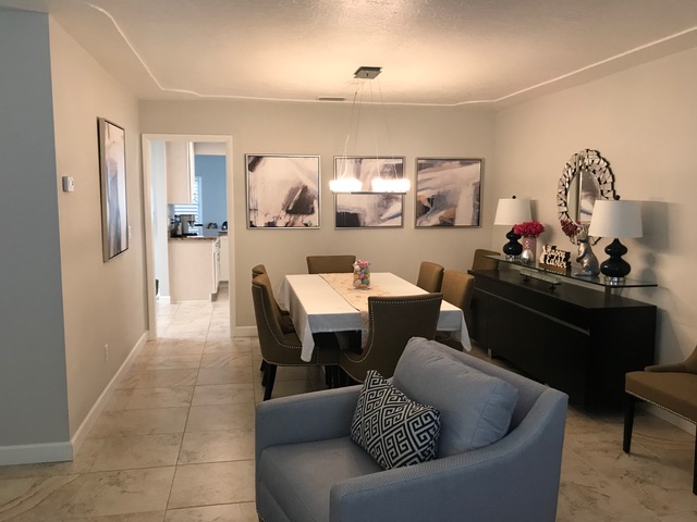 The formal living and dining area before the remodel. 