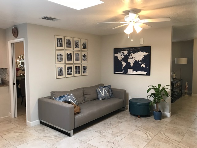 This L-shaped wall made the space feel a lot smaller than it was.