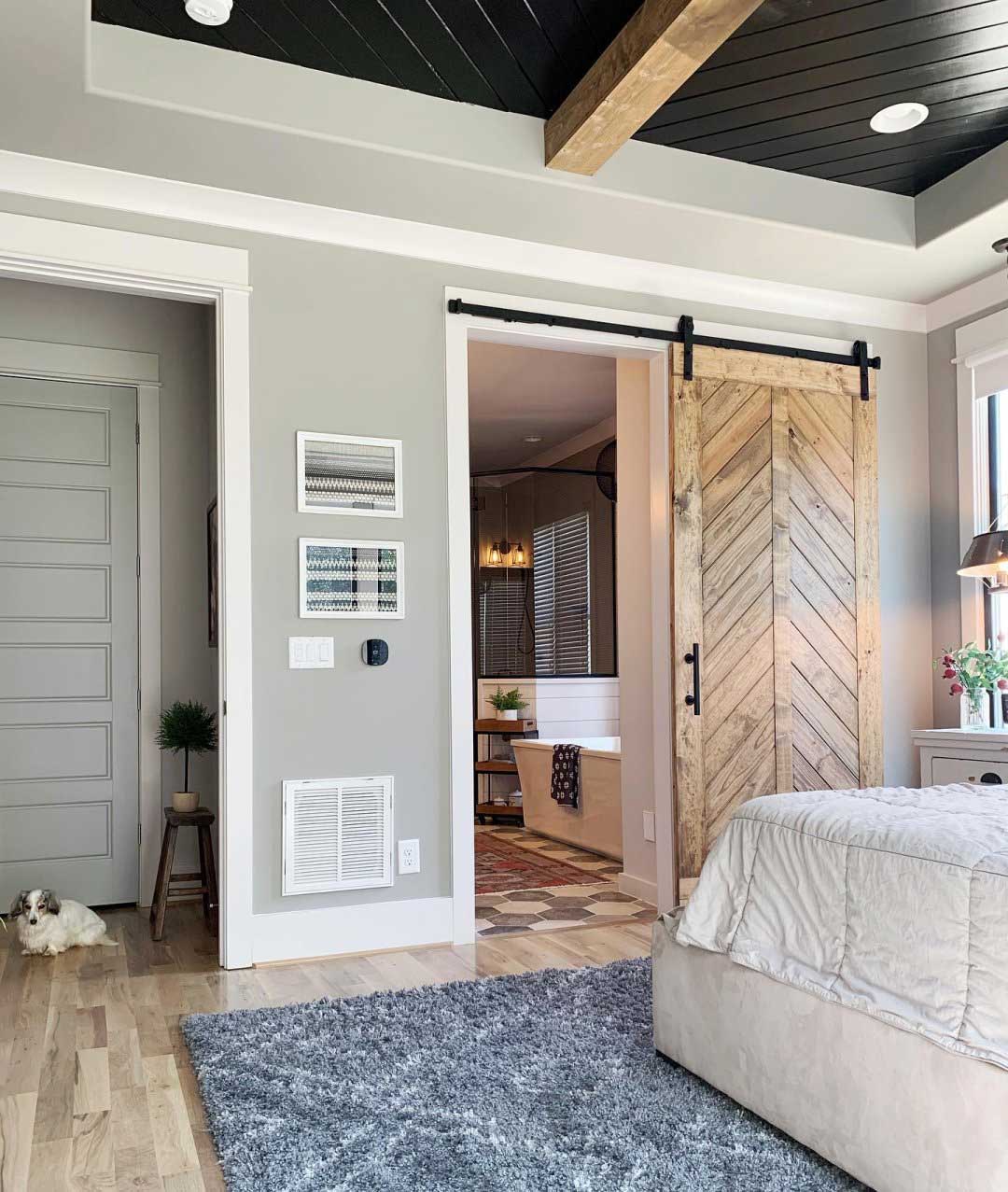 A Tricorn Black painted ceiling makes a strong connection between the floor, walls, and ceiling.