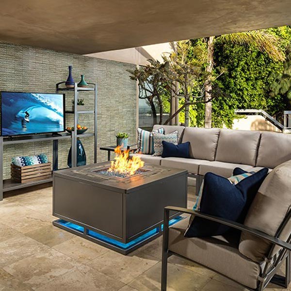 An outdoor living space should ideally have some sort of overhead covering to provide protection from the sun and rain during the summer, or any time when the weather conditions are enough to drive everyone inside.