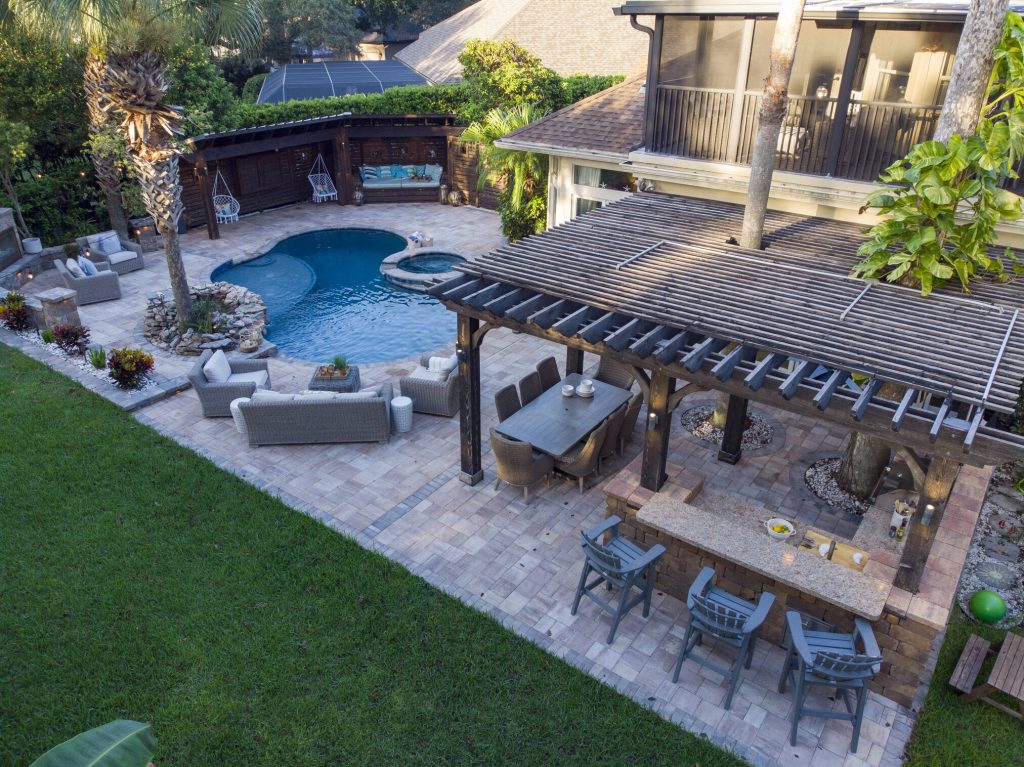 Another of the essential fall outdoor living ideas to consider is adding an overhead covering for more comfort.