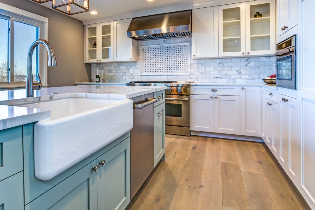 Kitchen style - larger flooring planks opens up a space.