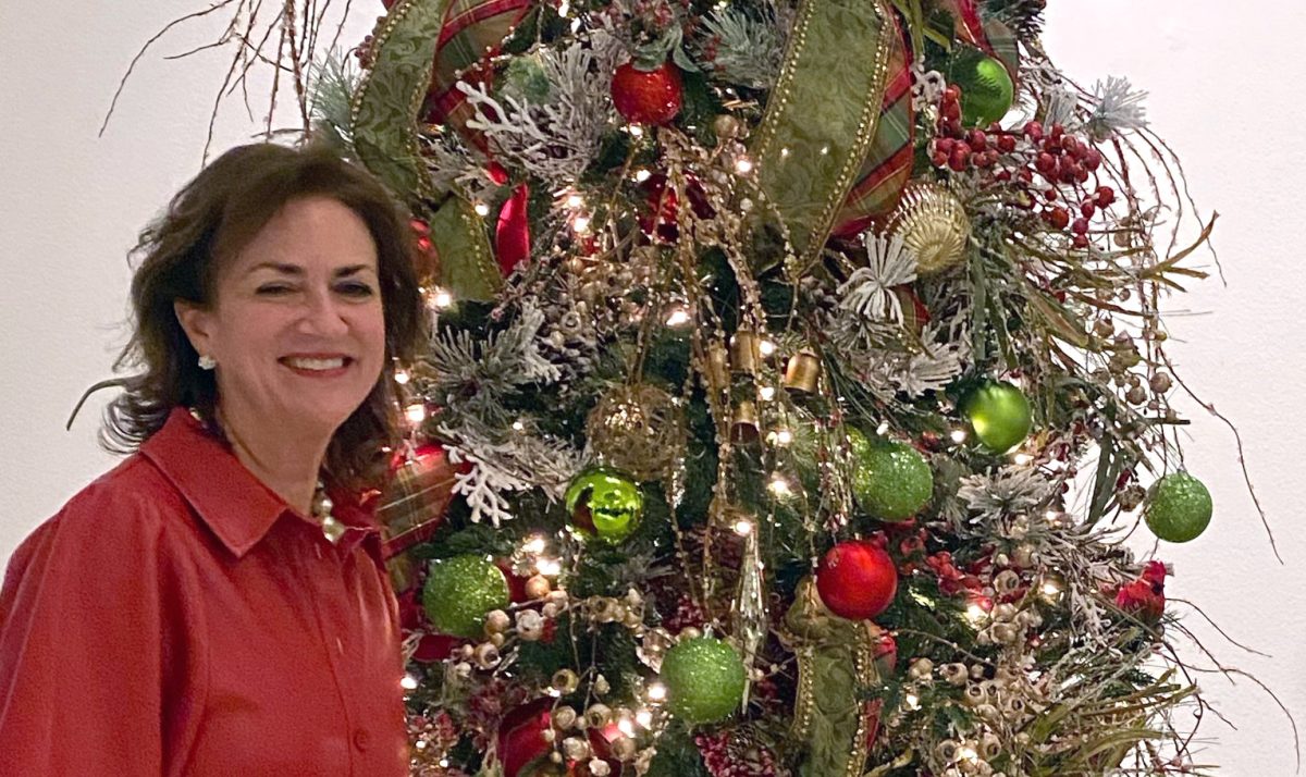 Christmas tree decorating at the 2023 Festival of Trees.