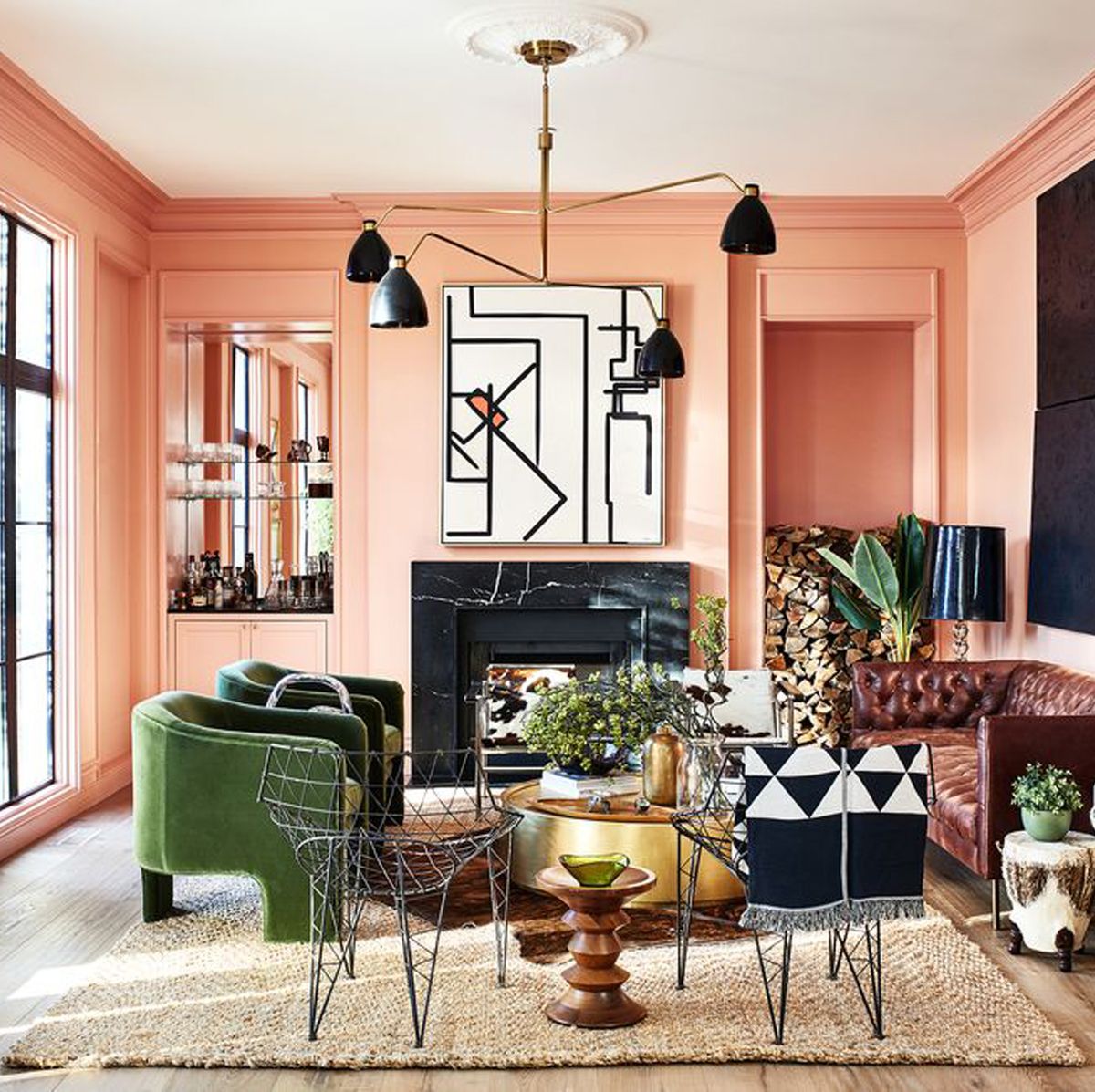 A peach-kissed living room painted in Peach Fuzz, Pantone's 2024 Color of the Year.