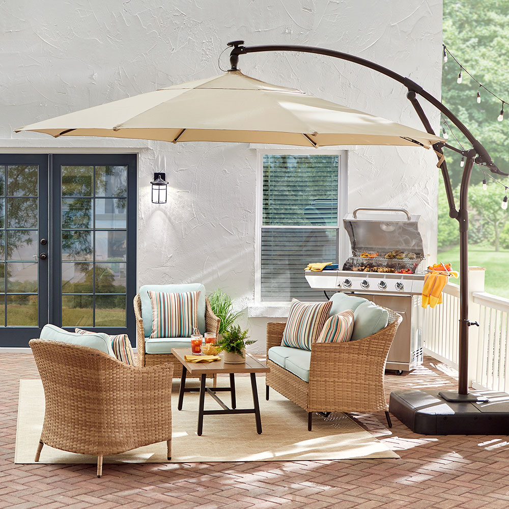 how-to-create-a-shady-haven-2022-hero If your deck or patio isn’t covered, add a stylish umbrella to the mix.
