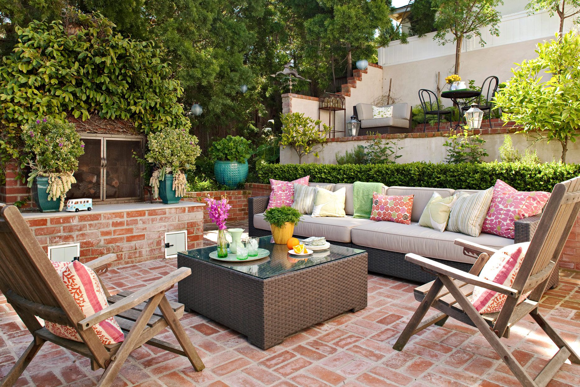 brick-patio-various-colored-throw-pillows-16fbe95a-e6f9d9b30f834b14a88074de0fb540b3 Preparing your space for a backyard BBQ party.