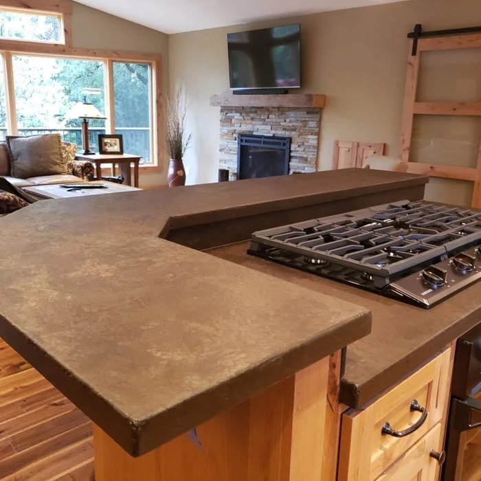 Afton-Split-Level-Concrete-Island-With-Built-In-Cook-Top Concrete countertops 1