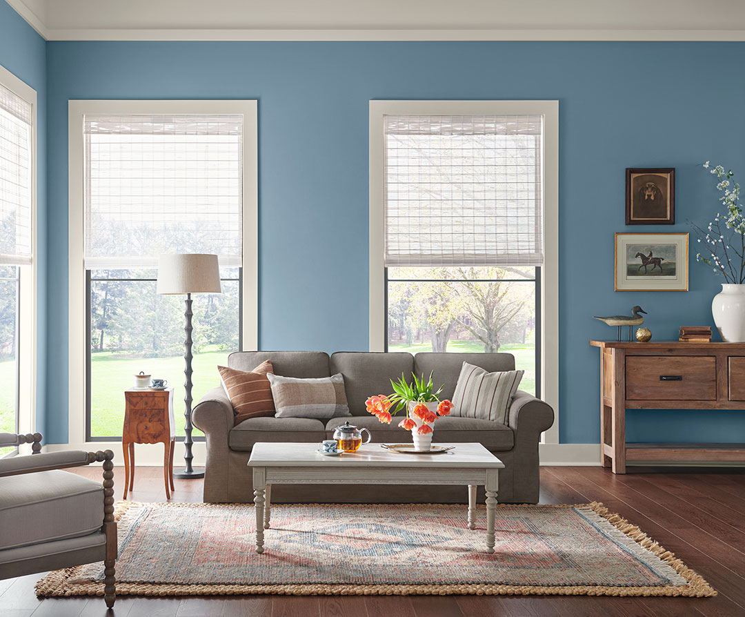 A backdrop of Smoky Azurite’s relaxed vibrance infuses the room with freshness.