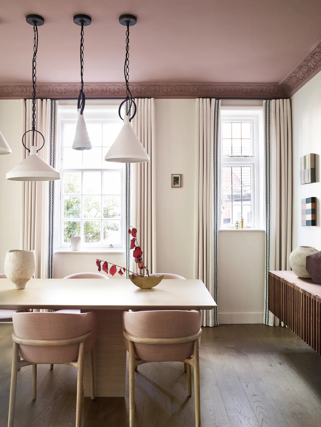 Having a darker ceiling is not a bad thing when you’re looking to foster intimacy in a space like a dining room, where you want people to draw together.