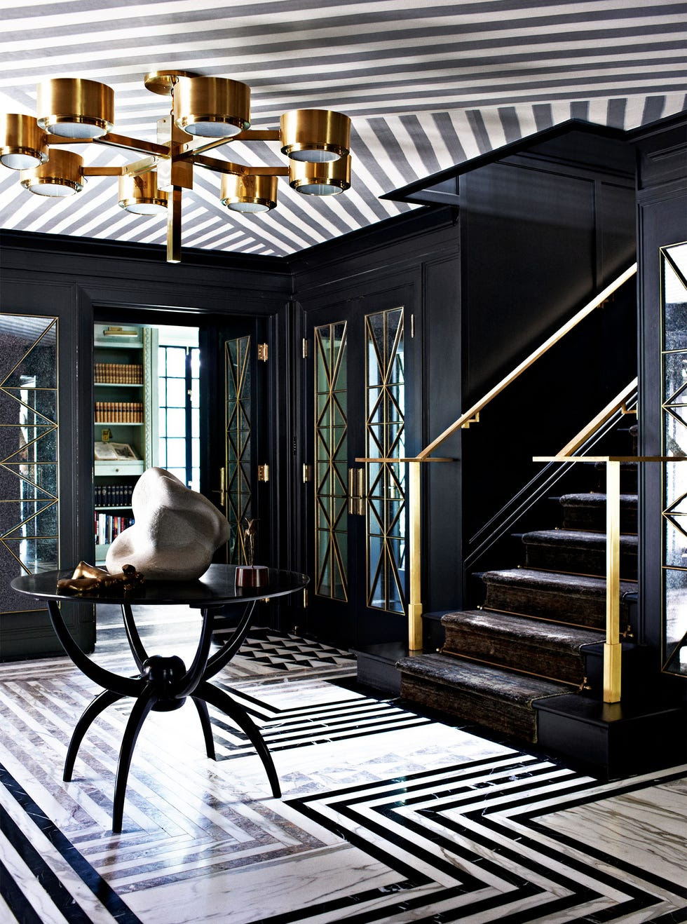 3 different kinds of black-and-white marble were used in this stylish floor design.