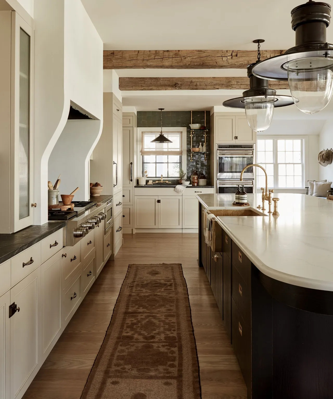 This design style is all about creating elegant, cozy spaces that feel both lived-in and polished.