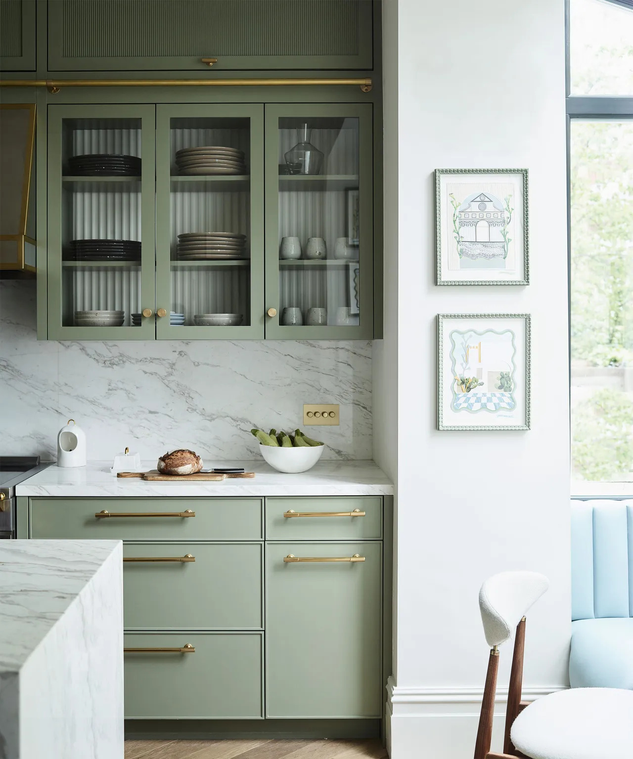 Sage green kitchens are making a comeback in 2025.