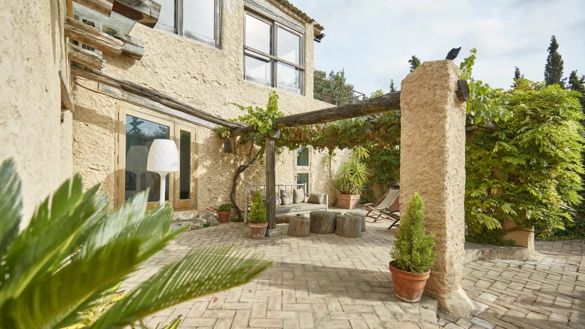 Transform your outdoor space with Mediterranean patio ideas, including terracotta pots, flowering vines, and rustic furniture.