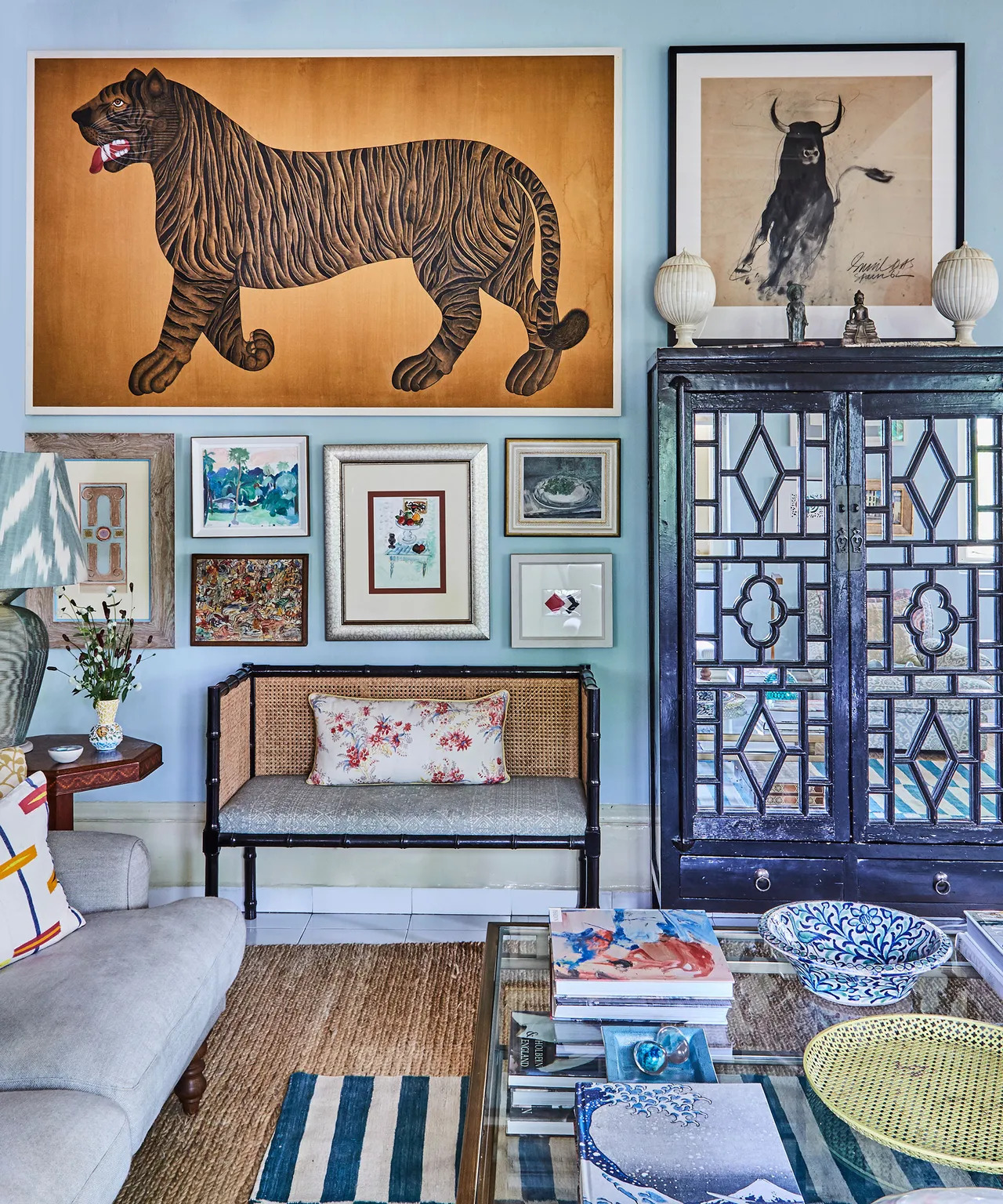 Curate your own gallery wall by hanging artwork together as a cluster.