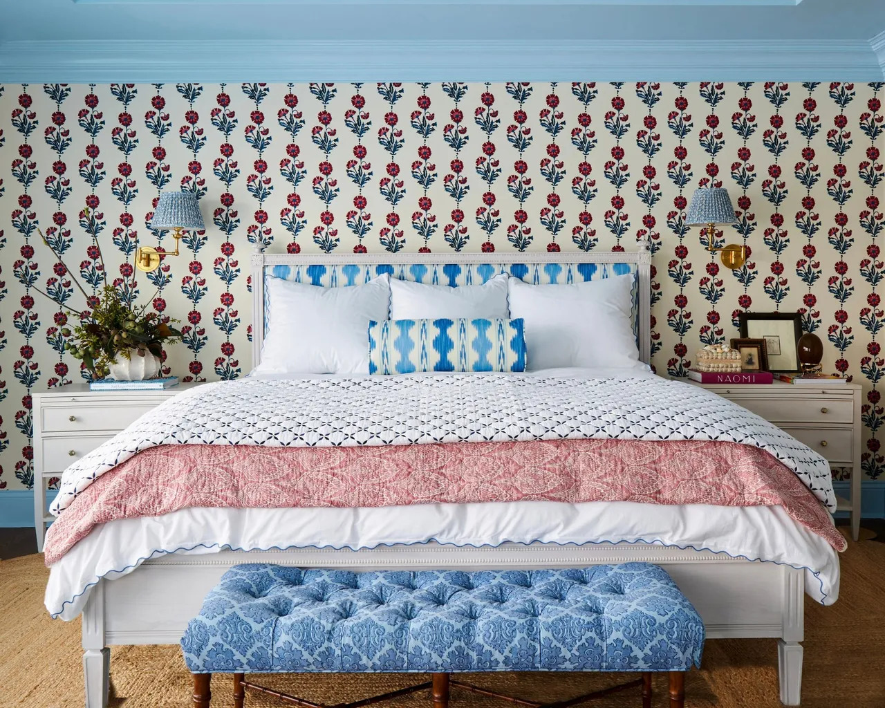 Softer, subtle bedroom decor with blue and red.