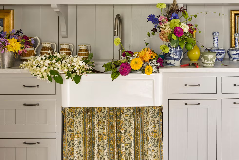Small touches can make a big impact. Skirted sinks in utility areas like laundry rooms or mudrooms bring a softness that balances functional spaces.